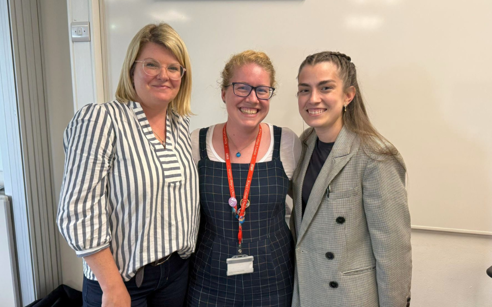 A staff member from King's College London and staff from Qualification Check